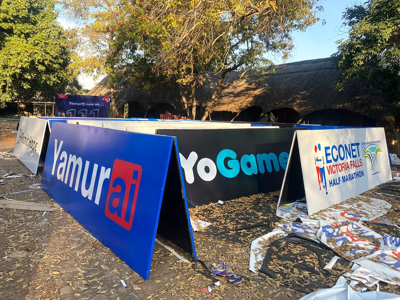 Branded Yamurai, YoGame and Econet event boards arranged outdoors
