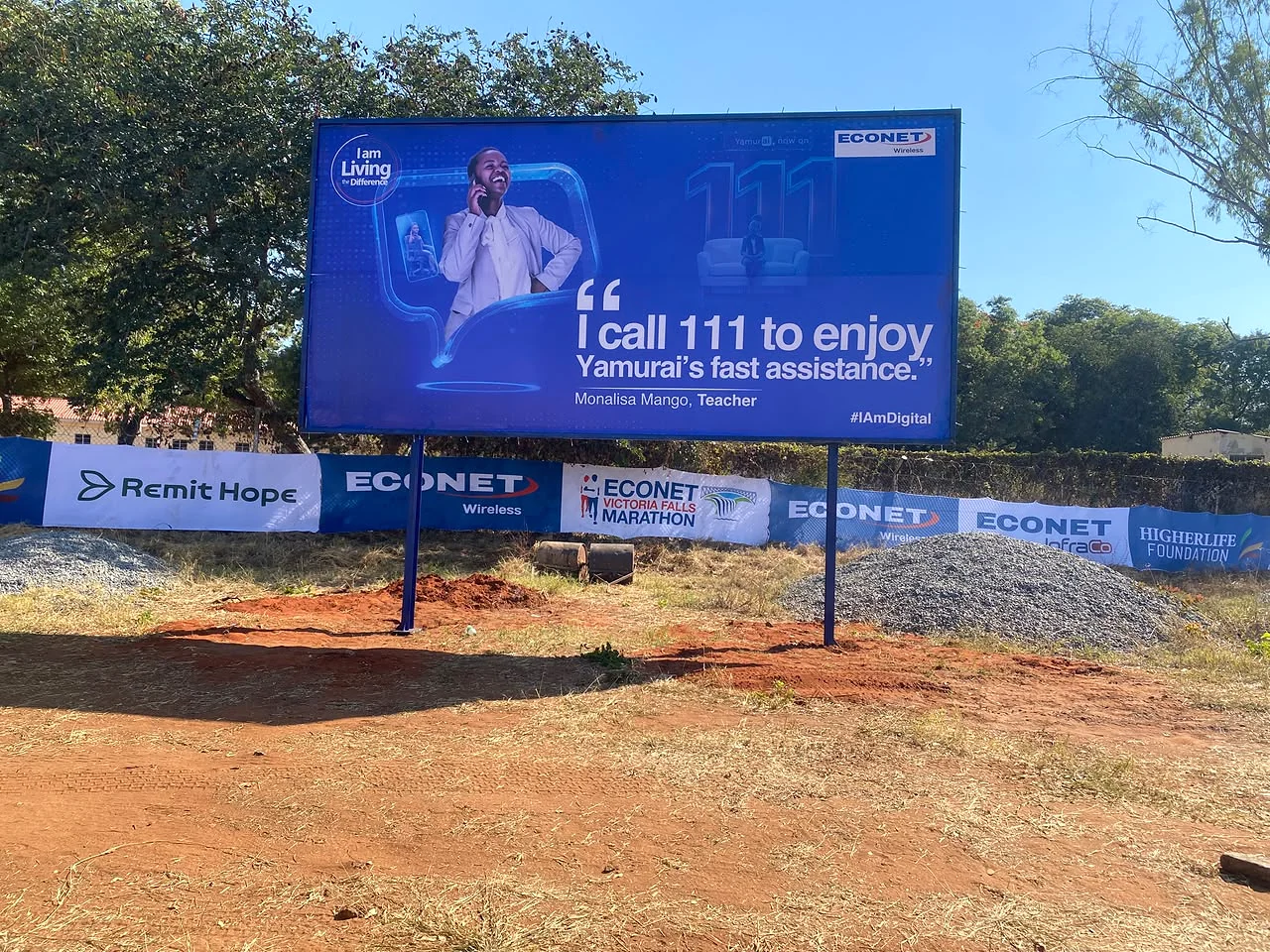 Econet Yamurai roadside billboard with matching event perimeter branding