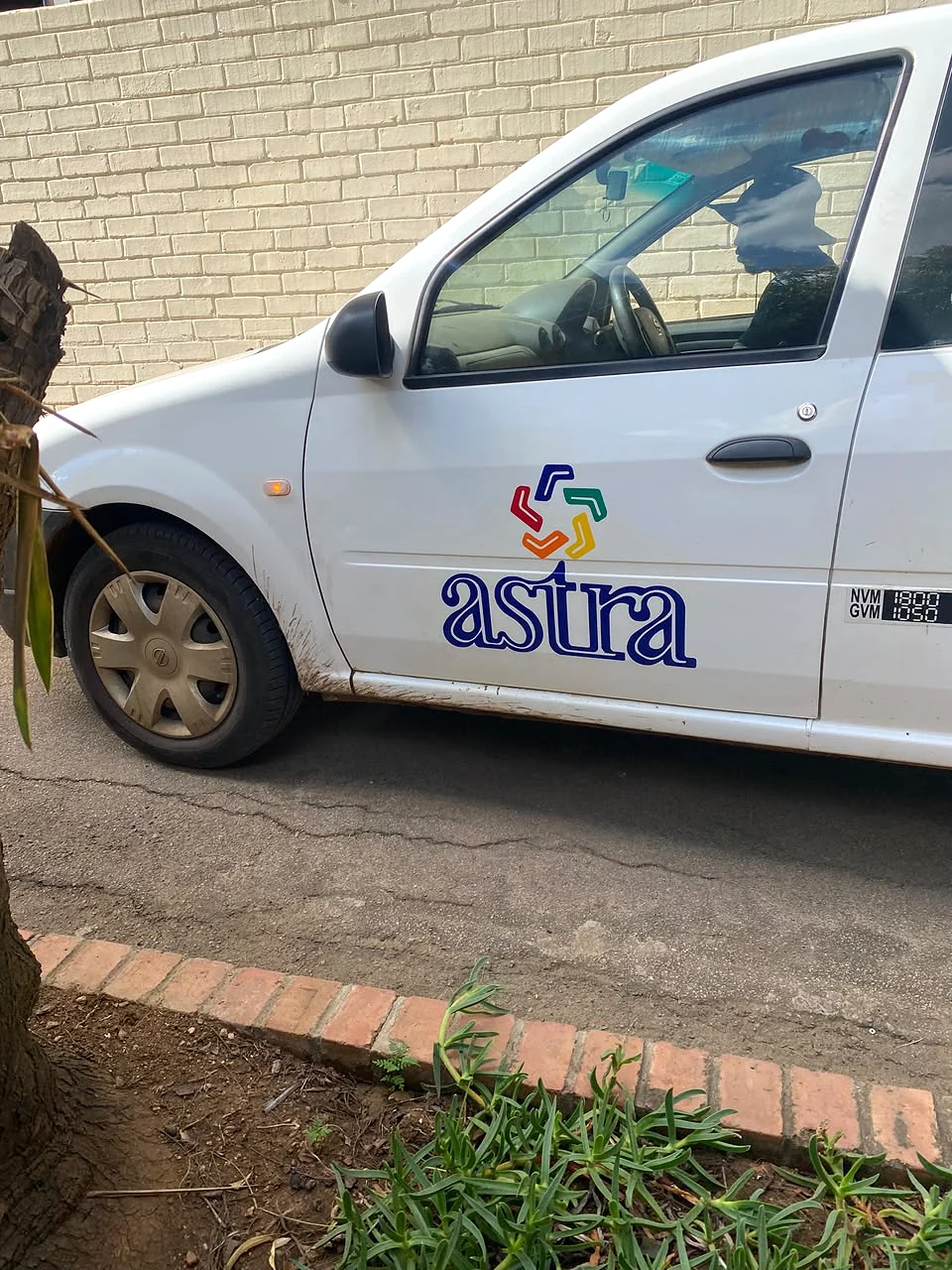 Astra passenger vehicle with branded graphics