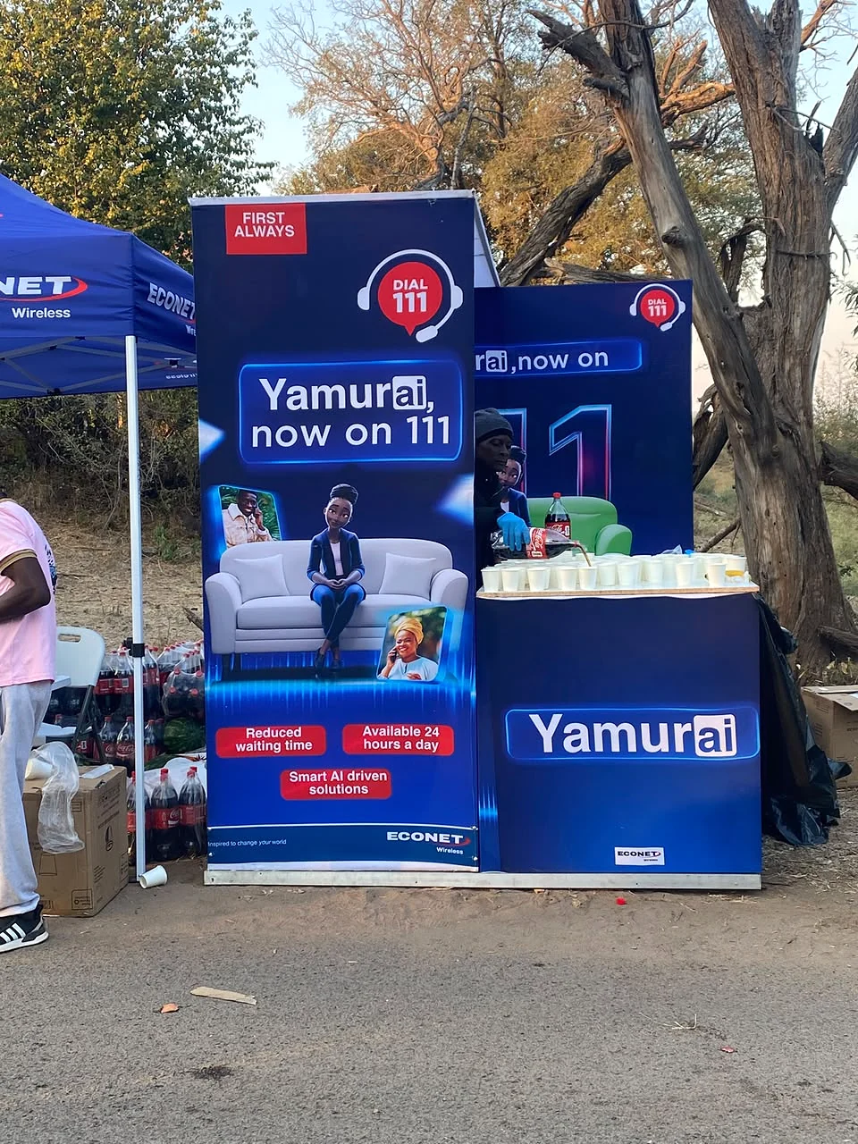 Yamurai branded roll-up display and event counter beneath an Econet tent